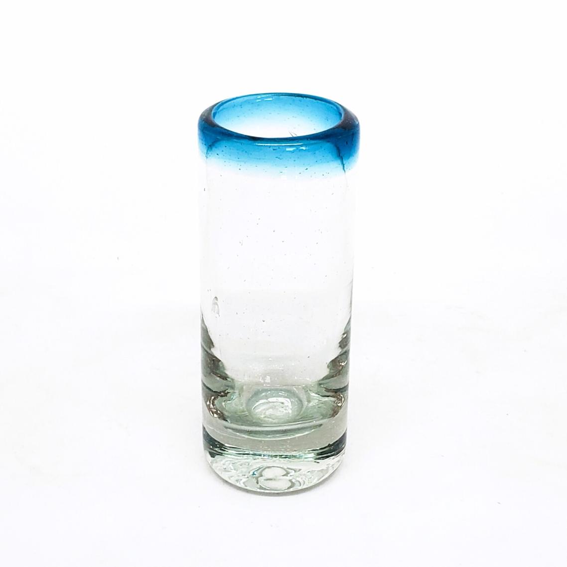 Sale Items / Aqua Blue Rim 2 oz Tequila Shot Glasses  / Reminiscent of the turquoise Caribbean waters of Tulum, our Aqua Blue Rim shot glasses are perfect for enjoying mezcal or any other liquor.